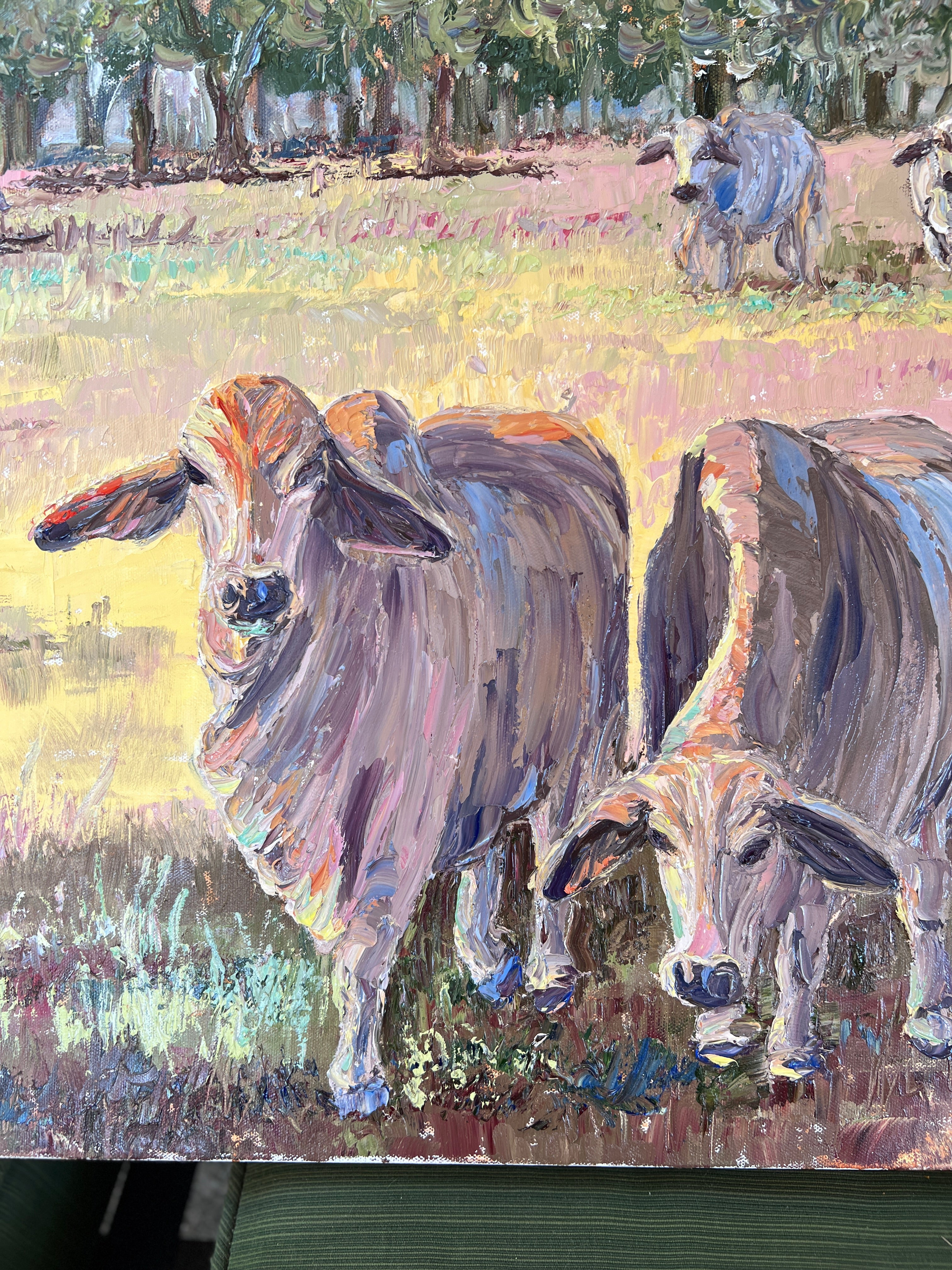 Impressionistic oil painting of two cows standing in a grassy field, with trees in the background. The artwork uses visible brushstrokes in muted gray, brown, yellow, green, and blue tones.