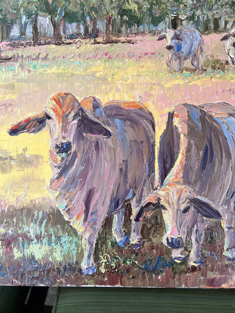 Impressionistic oil painting of two cows standing in a grassy field, with trees in the background. The artwork uses visible brushstrokes in muted gray, brown, yellow, green, and blue tones.